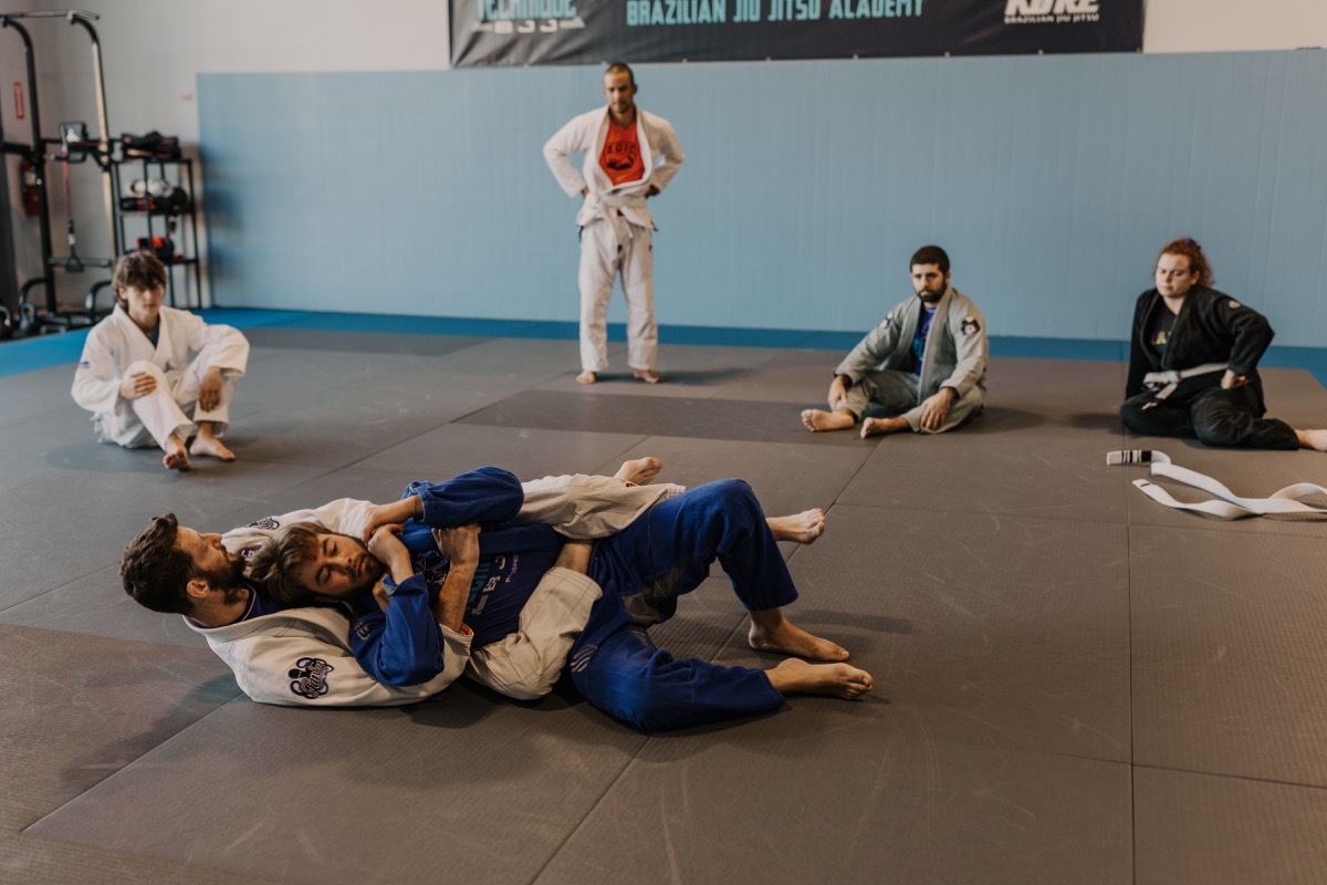 Coach demonstrating a technique