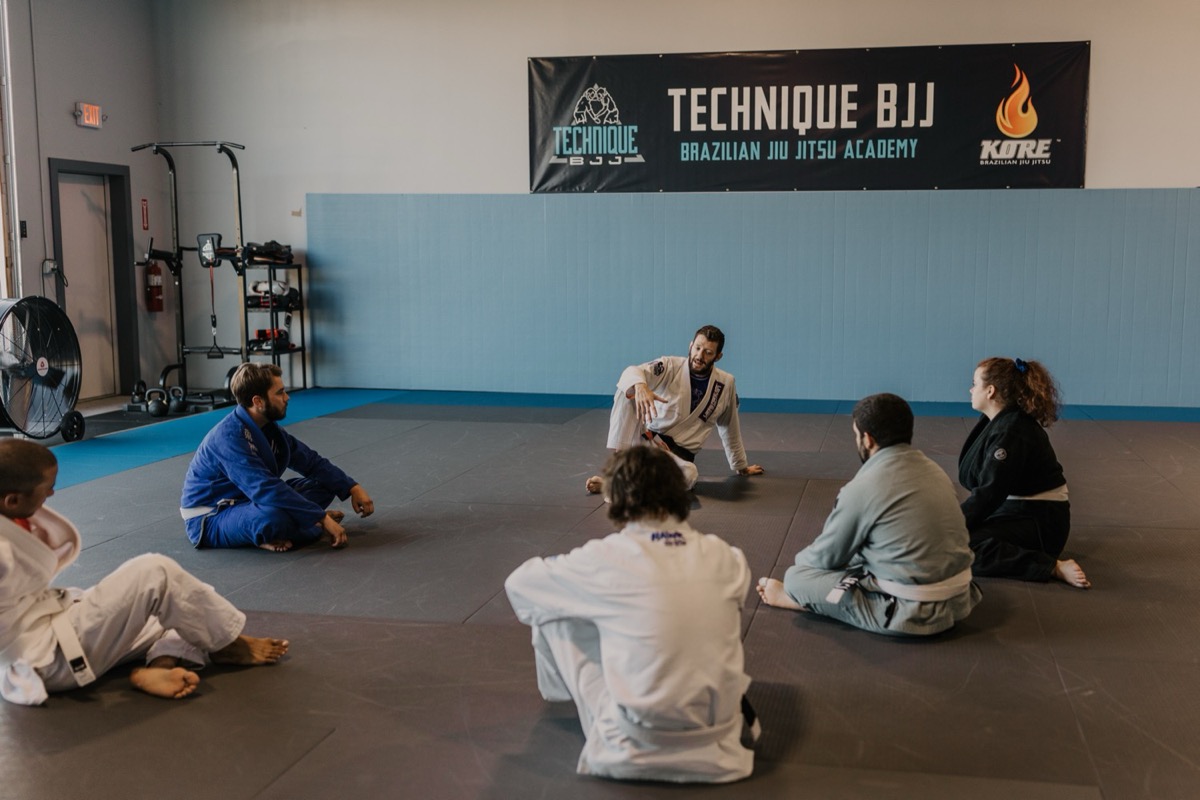 Coach teaching a class